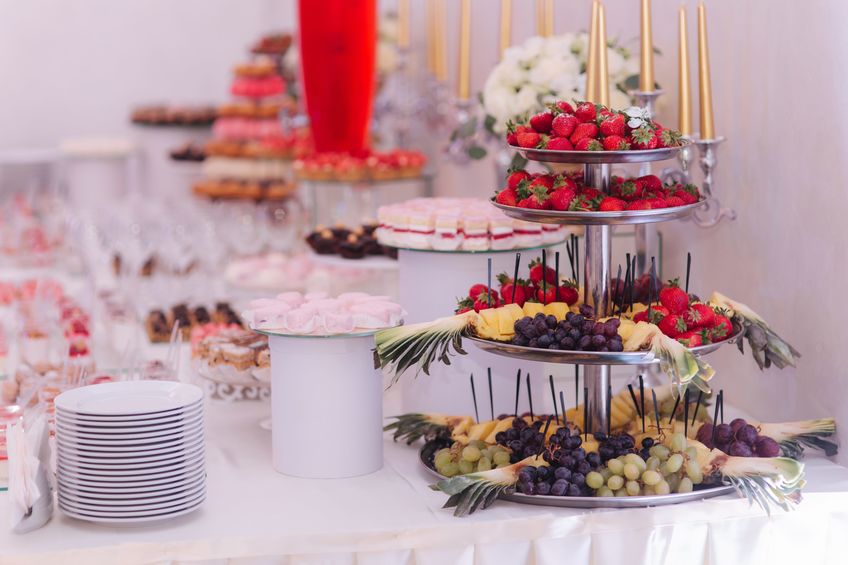 Sweet deserts on the table. different desserts on candy bar